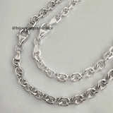 Chaîne maille forçat 5.2 mm en argent massif, finition brillante, bijou pour homme élégant et robuste, disponible avec option rhodiée.