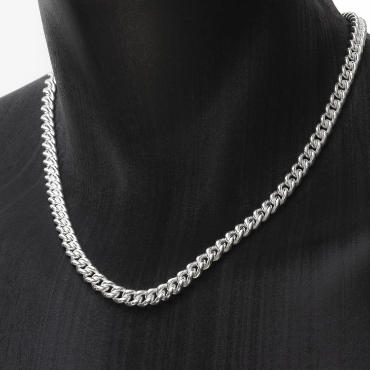 Collier argent massif homme, maille gourmette ronde de 7mm de largeur, disponible de 45 à 70 cm de longueur.