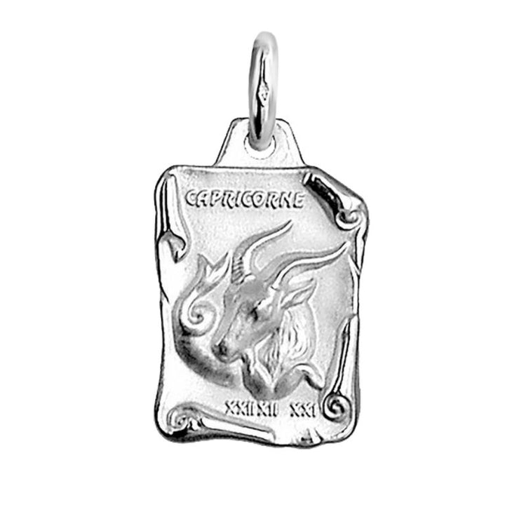 Pendentif astrologique en argent avec le signe du capricorne